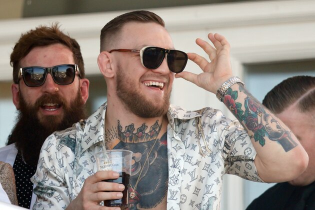 LIVERPOOL, UNITED KINGDOM - APRIL 08: (EMBARGOED FOR PUBLICATION IN UK NEWSPAPERS UNTIL 48 HOURS AFTER CREATE DATE AND TIME) Conor McGregor, current UFC Lightweight Champion,  watches the racing as he attends day 3 'Grand National Day' of the Randox Health Grand National Festival at Aintree Racecourse on April 8, 2017 in Liverpool, England. (Photo by Max Mumby/Indigo/Getty Images)