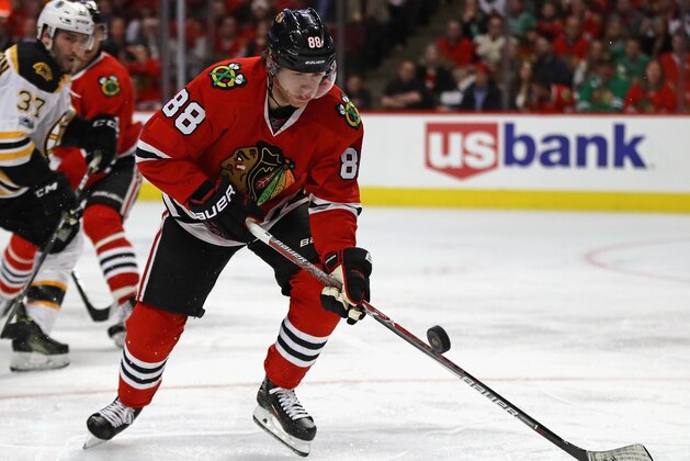 CHICAGO, IL - APRIL 02:  Patrick Kane #88 of the Chicago Blackhawks takes a pass off of his stick against the Boston Bruins at the United Center on April 2, 2017 in Chicago, Illinois. (Photo by Jonathan Daniel/Getty Images)