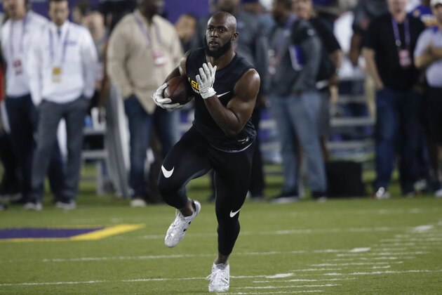 LSU running back Leonard Fournette runs through drills during their NCAA college football pro day in Baton Rouge, La., Wednesday, April 5, 2017. (AP Photo/Gerald Herbert)