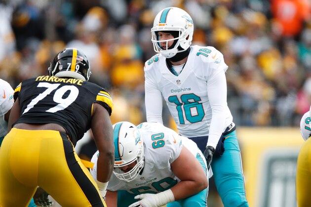 PITTSBURGH, PA - JANUARY 08:  T.J. Yates #16 of the Miami Dolphins takes a snap for injured quarterback Matt Moore #8 against the Pittsburgh Steelers in the AFC Wild Card game at Heinz Field on January 8, 2017 in Pittsburgh, Pennsylvania.  (Photo by Gregory Shamus/Getty Images)