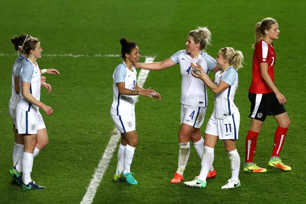MILTON KEYNES, ENGLAND - APRIL 10:  Lucy Bronze of England (obscured left) celebrates as she scores their second goal with team mates during the Women's International Friendly match between England and Austria at Stadium mk on April 10, 2017 in Milton Keynes, England.  (Photo by David Rogers/Getty Images)