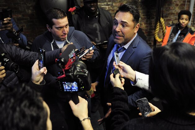 PHILADELPHIA, PA - DECEMBER 05: Oscar De La Hoya, boxing great and Chairman and CEO of Golden Boy Promotions, fields questions form reporters during a Bernard Hopkins media workout at the Joe Hand Boxing Gym on December 5, 2016 in Philadelphia, Pennsylvania. Light heavyweight Bernard Hopkins, 51-years-old, will fight Joe Smith, Jr. in a December 17 headline farewell bout billed 'The Final One,' in Inglewood, California. (Photo by Corey Perrine/Getty Images)