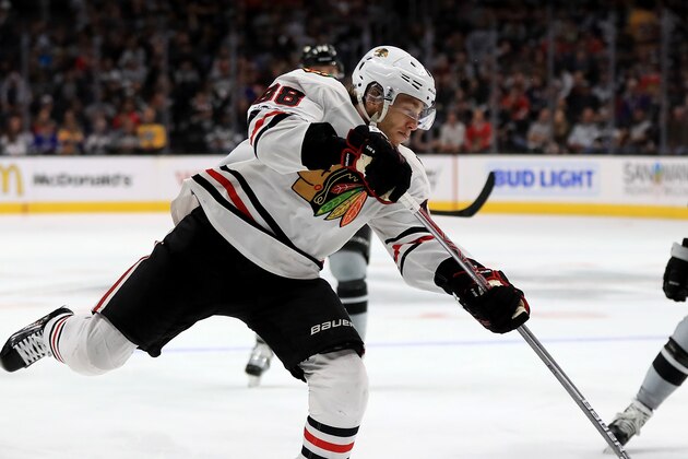 LOS ANGELES, CA - APRIL 08:  Patrick Kane #88 of the Chicago Blackhawks shoots the puck as Tyler Toffoli #73 of the Los Angeles Kings defends during the third  period of a game against the Los Angeles Kings at Staples Center on April 8, 2017 in Los Angeles, California.  (Photo by Sean M. Haffey/Getty Images)