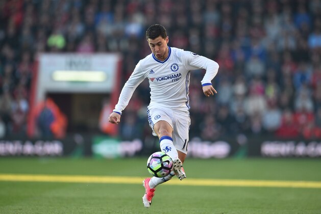 Chelsea's Belgian midfielder Eden Hazard chases the ball down during the English Premier League football match between Bournemouth and Chelsea at the Vitality Stadium in Bournemouth, southern England on April 8, 2017. / AFP PHOTO / Glyn KIRK / RESTRICTED TO EDITORIAL USE. No use with unauthorized audio, video, data, fixture lists, club/league logos or 'live' services. Online in-match use limited to 75 images, no video emulation. No use in betting, games or single club/league/player publications.  /         (Photo credit should read GLYN KIRK/AFP/Getty Images)