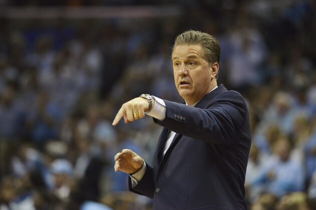 Kentucky head coach John Calipari watches the action in the first half of the South Regional final game against North Carolina in the NCAA college basketball tournament Sunday, March 26, 2017, in Memphis, Tenn. (AP Photo/Brandon Dill)