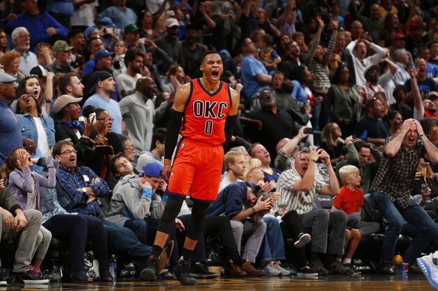 Oklahoma City Thunder guard Russell Westbrook celebrates after hitting a buzzer-beating, 3-point shot to win the game against the Denver Nuggets following a basketball game, Sunday, April 9, 2017, in Denver. Oklahoma City beat Denver 106-105. Westbrook also broke the NBA record for triple doubles with 42. (AP Photo/Jack Dempsey)