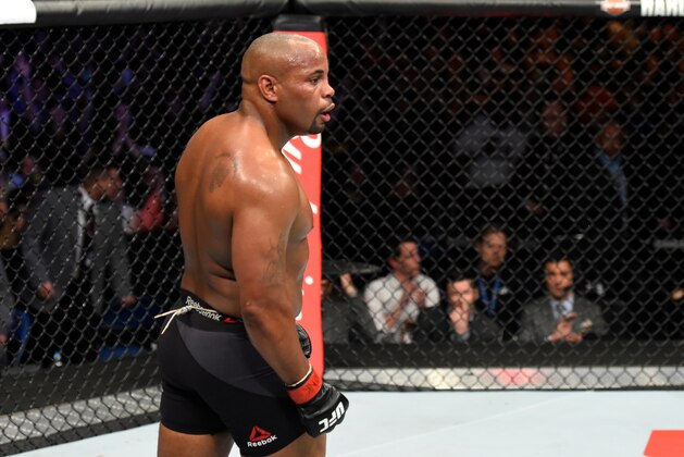 BUFFALO, NY - APRIL 08: Daniel Cormier reacts after his rear choke submission victory over Anthony Johnson in their UFC light heavyweight championship bout during the UFC 210 event at KeyBank Center on April 8, 2017 in Buffalo, New York.  (Photo by Josh Hedges/Zuffa LLC/Zuffa LLC via Getty Images)