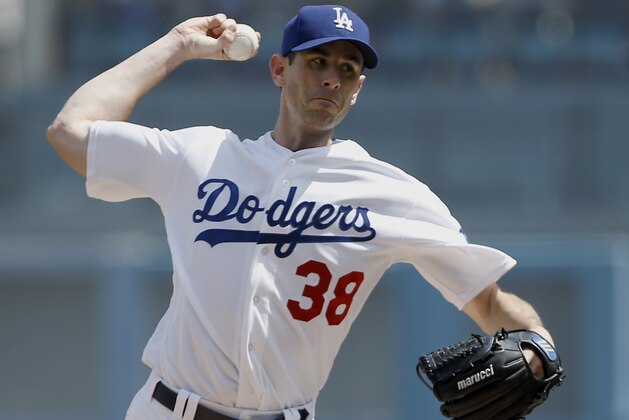 Los Angeles Dodgers pitcher Brandon McCarthy throws to the plate against the San Diego Padres during the first inning of a baseball game in Los Angeles, Thursday, April 6, 2017. (AP Photo/Alex Gallardo)