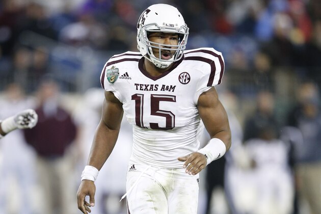 NASHVILLE, TN - DECEMBER 30: Myles Garrett #15 of the Texas A&M Aggies in action against the Louisville Cardinals during the Franklin American Mortgage Music City Bowl at Nissan Stadium on December 30, 2015 in Nashville, Tennessee. Louisville defeated Texas A&M 27-21. (Photo by Joe Robbins/Getty Images)
