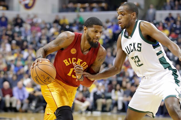 INDIANAPOLIS, IN - APRIL 06:  Paul George #13 of the Indiana Pacers dribbles the ball against the Milwaukee Bucks  at Bankers Life Fieldhouse on April 6, 2017 in Indianapolis, Indiana.    NOTE TO USER: User expressly acknowledges and agrees that, by downloading and or using this photograph, User is consenting to the terms and conditions of the Getty Images License Agreement  (Photo by Andy Lyons/Getty Images)