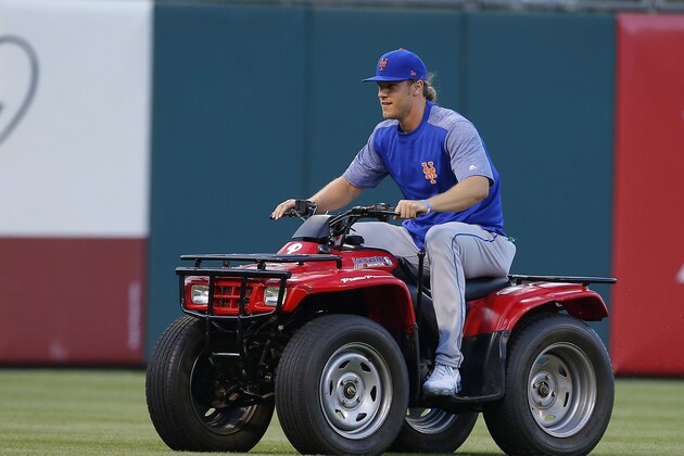 PHILADELPHIA, PA - APRIL 10: Noah Syndergaard #34 of the New York Mets steals the Phillies Phanatic's ATV before a game against the Philadelphia Phillies at Citizens Bank Park on April 10, 2017 in Philadelphia, Pennsylvania. (Photo by Rich Schultz/Getty Images)