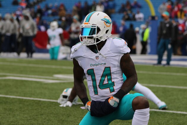 ORCHARD PARK, NY - DECEMBER 24:   Jarvis Landry #14 of the Miami Dolphins warms up before the game against the Buffalo Bills at New Era Stadium on December 24, 2016 in Orchard Park, New York.  (Photo by Michael Adamucci/Getty Images)