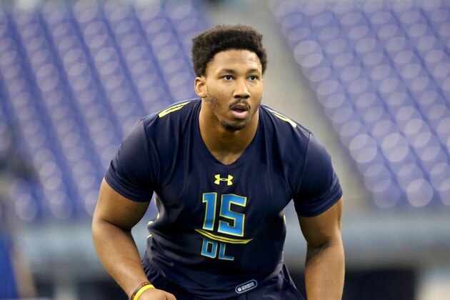 Texas A&M defensive end Myles Garrett competes in a drill at the 2017 NFL football scouting combine Sunday, March 5, 2017, in Indianapolis. (AP Photo/Gregory Payan)