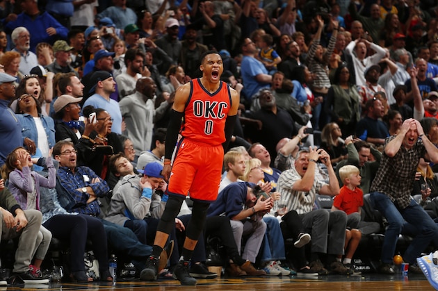 Oklahoma City Thunder guard Russell Westbrook celebrates after hitting a buzzer-beating, 3-point shot to win the game against the Denver Nuggets following a basketball game, Sunday, April 9, 2017, in Denver. Oklahoma City beat Denver 106-105. Westbrook also broke the NBA record for triple doubles with 42. (AP Photo/Jack Dempsey)