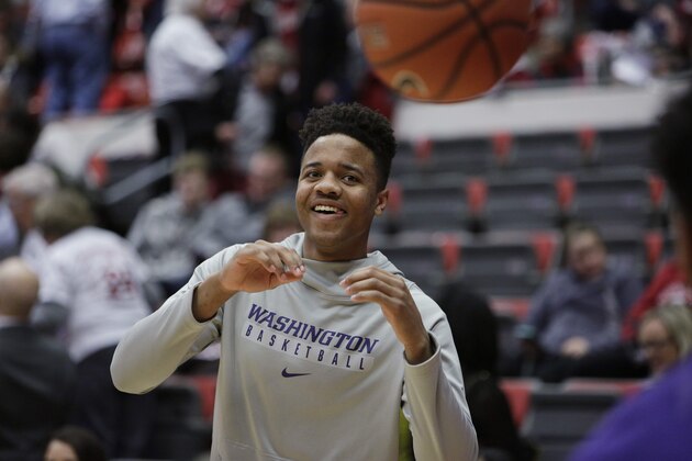 Washington guard Markelle Fultz, who is out with a sore knee, has the ball passed to him before an NCAA college basketball game against Washington State in Pullman, Wash., Sunday, Feb. 26, 2017. (AP Photo/Young Kwak)