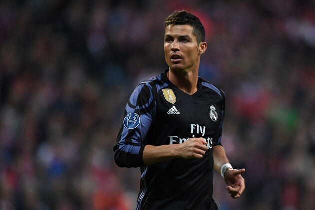 MUNICH, GERMANY - APRIL 12: Cristiano Ronaldo of Real Madrid in action during the UEFA Champions League Quarter Final first leg match between FC Bayern Muenchen and Real Madrid CF at Allianz Arena on April 12, 2017 in Munich, Germany. (Photo by Etsuo Hara/Getty Images)