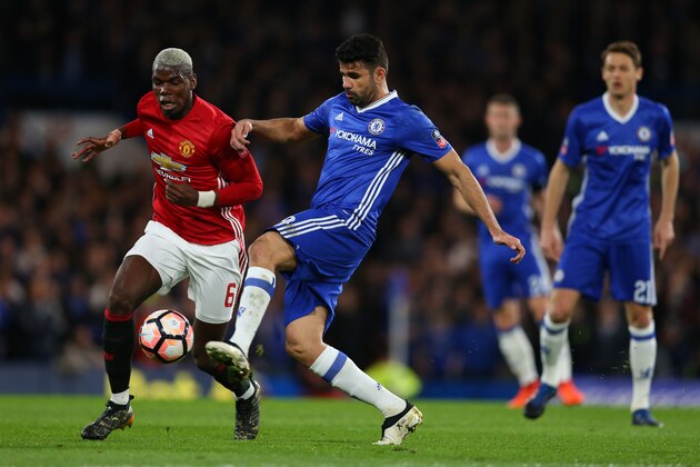 LONDON, ENGLAND - MARCH 13: Paul Pogba of Manchester United and Diego Costa of Chelsea during The Emirates FA Cup Quarter-Final match between Chelsea and Manchester United at Stamford Bridge on March 13, 2017 in London, England. (Photo by Catherine Ivill - AMA/Getty Images)
