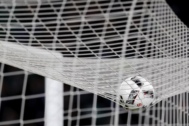 WOLFSBURG, GERMANY - APRIL 05:  The Bundesliga ball is pictured in the goal net during the Bundesliga match between VfL Wolfsburg and SC Freiburg at Volkswagen Arena on April 5, 2017 in Wolfsburg, Germany.  (Photo by Boris Streubel/Getty Images)