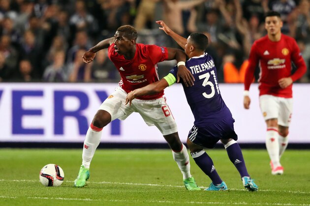 BRUSSELS, BELGIUM - APRIL 13: Paul Pogba of Manchester United and Youri Tielemans of Anderlecht during the UEFA Europa League quarter final first leg match between RSC Anderlecht and Manchester United at Constant Vanden Stock Stadium on April 13, 2017 in Brussels, Belgium. (Photo by Matthew Ashton - AMA/Getty Images)