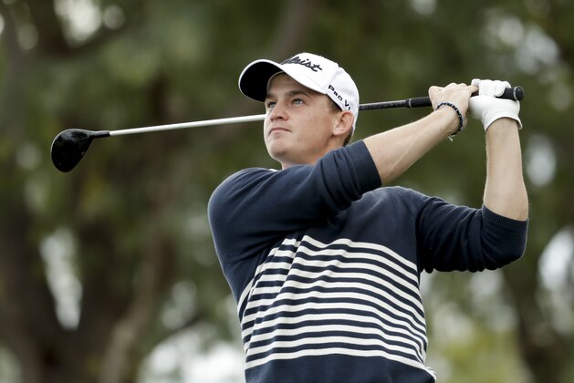 Bud Cauley watches his tee shot on the sixth hole during the final round of the CareerBuilder Challenge golf tournament on the Stadium Course at PGA West, Sunday, Jan. 22, 2017, in La Quinta, Calif. (AP Photo/Chris Carlson)