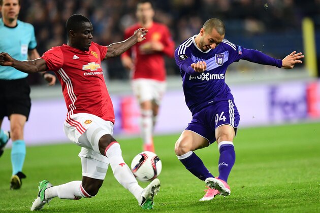 RSC Anderlecht's Algerian midfielder Sofiane Hanni and Manchester United's Ivorian defender Eric Bailly (L) vie for the ball during the UEFA Europa League first leg quarter-final football match between Anderlecht and Manchester United at the Constant Vanden Stock stadium in Brussels on April 13, 2017. / AFP PHOTO / EMMANUEL DUNAND        (Photo credit should read EMMANUEL DUNAND/AFP/Getty Images)