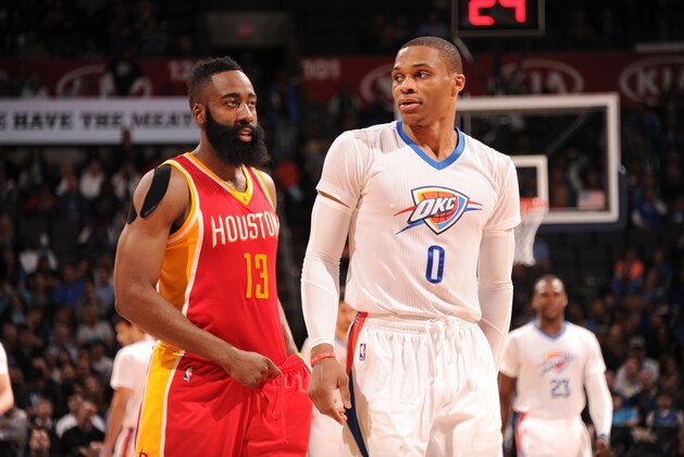 OKLAHOMA CITY, OK- APRIL 5:  James Harden #13 of the Houston Rockets and Russell Westbrook #0 of the Oklahoma City Thunder during the game on April 5, 2015 at Chesapeake Energy Arena in Oklahoma City, Oklahoma. NOTE TO USER: User expressly acknowledges and agrees that, by downloading and or using this photograph, User is consenting to the terms and conditions of the Getty Images License Agreement. Mandatory Copyright Notice: Copyright 2015 NBAE (Photo by Bill Baptist/NBAE via Getty Images)