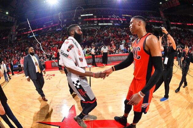HOUSTON, TX - MARCH 26:  James Harden #13 of the Houston Rockets greets Russell Westbrook #0 of the Oklahoma City Thunder on March 26, 2017 at the Toyota Center in Houston, Texas. NOTE TO USER: User expressly acknowledges and agrees that, by downloading and/or using this photograph, user is consenting to the terms and conditions of the Getty Images License Agreement. Mandatory Copyright Notice: Copyright 2017 NBAE (Photo by Jesse D. Garrabrant/NBAE via Getty Images)