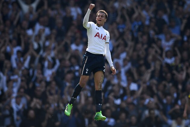 TOPSHOT - Tottenham Hotspur's English midfielder Dele Alli celebrates scoring his team's first goal during the English Premier League football match between Tottenham Hotspur and Watford at White Hart Lane in London, on April 8, 2017. / AFP PHOTO / Justin TALLIS / RESTRICTED TO EDITORIAL USE. No use with unauthorized audio, video, data, fixture lists, club/league logos or 'live' services. Online in-match use limited to 75 images, no video emulation. No use in betting, games or single club/league/player publications.  /         (Photo credit should read JUSTIN TALLIS/AFP/Getty Images)