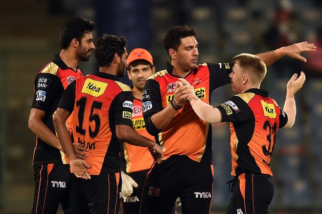 Sunrisers Hyderabad captain David Warner (R) celebrates the victory over Kolkata Knight Riders with teammates  during the 2016 Indian Premier League (IPL) Twenty20 eliminator cricket match between Kolkata Knight Riders and Sunrisers Hyderabad at the Feroz Shah Kotla Cricket Stadium in New Delhi on May 25, 2016. / AFP / PRAKASH SINGH        (Photo credit should read PRAKASH SINGH/AFP/Getty Images)