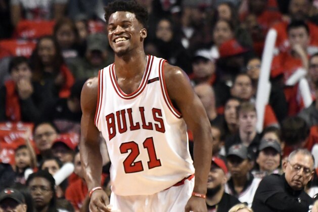 Chicago Bulls forward Jimmy Butler (21) smiles during the first half of an NBA basketball game against the Brooklyn Nets in Chicago, Wednesday, April 12, 2017. (AP Photo/David Banks)