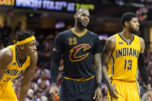 CLEVELAND, OH - FEBRUARY 15: Myles Turner #33 of the Indiana Pacers LeBron James #23 of the Cleveland Cavaliers and Paul George #13 of the Indiana Pacers pause on the court during the second half at Quicken Loans Arena on February 15, 2017 in Cleveland, Ohio. The Cavaliers defeated the Pacers 113-104. NOTE TO USER: User expressly acknowledges and agrees that, by downloading and/or using this photograph, user is consenting to the terms and conditions of the Getty Images License Agreement. (Photo by Jason Miller/Getty Images)