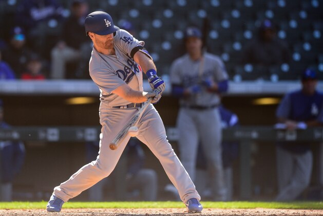DENVER, CO - APRIL 9: Logan Forsythe #11 of the Los Angeles Dodgers hits an eighth inning leadoff single against the Colorado Rockies at Coors Field on April 9, 2017 in Denver, Colorado.  (Photo by Dustin Bradford/Getty Images)
