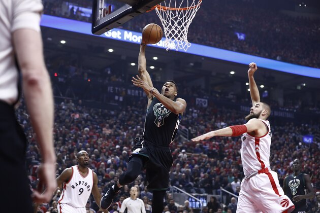 TORONTO, CANADA - APRIL 15: Giannis Antetokounmpo #34 of the Milwaukee Bucks shoots the ball against the Toronto Raptors against the Toronto Raptors on April 15, 2017 during Game One of Round One of the 2017 NBA Playoffs at the Air Canada Centre in Toronto, Ontario, Canada.  NOTE TO USER: User expressly acknowledges and agrees that, by downloading and or using this Photograph, user is consenting to the terms and conditions of the Getty Images License Agreement.  Mandatory Copyright Notice: Copyright 2016 NBAE (Photo by Mark Blinch/NBAE via Getty Images)