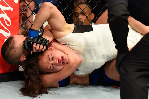 KANSAS CITY, MO - APRIL 15:  (L-R) Rose Namajunas attempts to submit Michelle Waterson in their women's strawweight fight during the UFC Fight Night event at Sprint Center on April 15, 2017 in Kansas City, Missouri. (Photo by Josh Hedges/Zuffa LLC/Zuffa LLC via Getty Images)