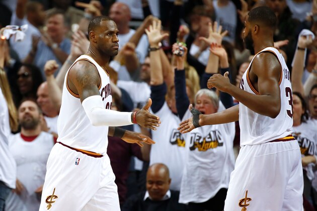 CLEVELAND, OH - APRIL 15: LeBron James #23 of the Cleveland Cavaliers reacts to a 109-108 win over the Indiana Pacers with Tristan Thompson #13 in Game One of the Eastern Conference Quarterfinals during the 2017 NBA Playoffs at Quicken Loans Arena on April 15, 2017 in Cleveland, Ohio. NOTE TO USER: User expressly acknowledges and agrees that, by downloading and or using this photograph, User is consenting to the terms and conditions of the Getty Images License Agreement.  (Photo by Gregory Shamus/Getty Images)