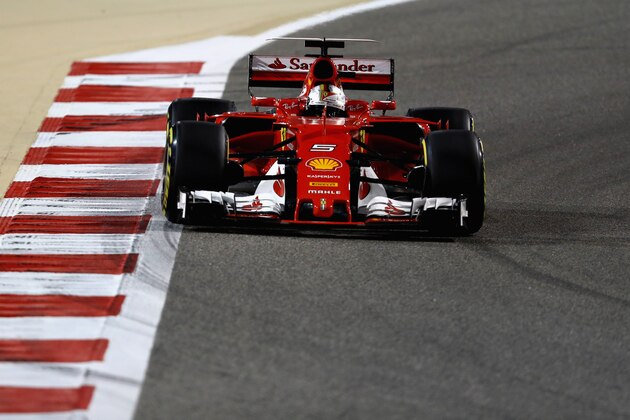 BAHRAIN, BAHRAIN - APRIL 16: Sebastian Vettel of Germany driving the (5) Scuderia Ferrari SF70H on track during the Bahrain Formula One Grand Prix at Bahrain International Circuit on April 16, 2017 in Bahrain, Bahrain.  (Photo by Clive Mason/Getty Images)