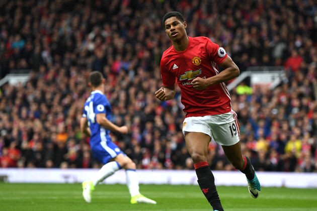 MANCHESTER, ENGLAND - APRIL 16: Marcus Rashford of Manchester United celebrates scoring his sides first goal during the Premier League match between Manchester United and Chelsea at Old Trafford on April 16, 2017 in Manchester, England.  (Photo by Shaun Botterill/Getty Images)
