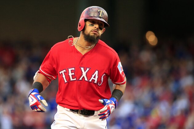 ARLINGTON, TX - APRIL 3: Rougned Odor #12 of the Texas Rangers rounds third base after hitting a three-run home run against the Cleveland Indians in the third inning on Opening Day at Globe Life Park in Arlington on April 3, 2017 in Arlington, Texas. (Photo by Ron Jenkins/Getty Images)