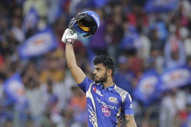 Mumbai Indians batsman Nitish Rana raises helmet a after scoring 50 runs during their Indian Premier League (IPL) cricket match against Gujarat Lions in Mumbai, India, Sunday, April 16, 2017. (AP Photo/Rafiq Maqbool)