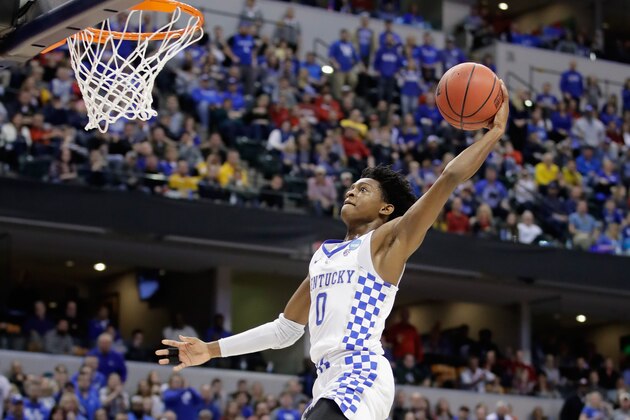 INDIANAPOLIS, IN - MARCH 19:  De'Aaron Fox #0 of the Kentucky Wildcats dunks against Landry Shamet #11 of the Wichita State Shockers in the second half during the second round of the 2017 NCAA Men's Basketball Tournament at the Bankers Life Fieldhouse on March 19, 2017 in Indianapolis, Indiana. The Kentucky Wildcats won 65-62.  (Photo by Andy Lyons/Getty Images)