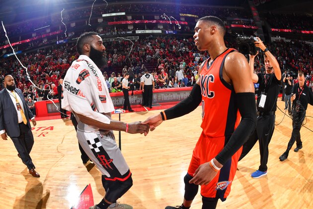 HOUSTON, TX - MARCH 26:  James Harden #13 of the Houston Rockets greets Russell Westbrook #0 of the Oklahoma City Thunder on March 26, 2017 at the Toyota Center in Houston, Texas. NOTE TO USER: User expressly acknowledges and agrees that, by downloading and/or using this photograph, user is consenting to the terms and conditions of the Getty Images License Agreement. Mandatory Copyright Notice: Copyright 2017 NBAE (Photo by Jesse D. Garrabrant/NBAE via Getty Images)