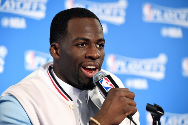 OAKLAND, CA - APRIL 16: Draymond Green #23 of the Golden State Warriors talks with the press after the game against the Portland Trail Blazers during the Western Conference Quarterfinals of the 2017 NBA Playoffs on April 16, 2017 at Oracle Arena in Oakland, California. NOTE TO USER: User expressly acknowledges and agrees that, by downloading and or using this photograph, user is consenting to the terms and conditions of Getty Images License Agreement. Mandatory Copyright Notice: Copyright 2017 NBAE (Photo by Garrett Ellwood/NBAE via Getty Images)