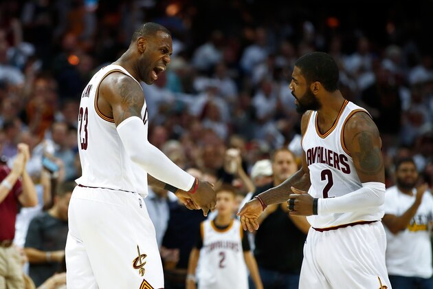 CLEVELAND, OH - APRIL 15: LeBron James #23 of the Cleveland Cavaliers celebrates a second half dunk with Kyrie Irving #2 while playing the Indiana Pacers in Game One of the Eastern Conference Quarterfinals during the 2017 NBA Playoffs at Quicken Loans Arena on April 15, 2017 in Cleveland, Ohio. Cleveland won the game 109-108 to take a 1-0 series lead. NOTE TO USER: User expressly acknowledges and agrees that, by downloading and or using this photograph, User is consenting to the terms and conditions of the Getty Images License Agreement.  (Photo by Gregory Shamus/Getty Images)