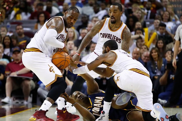 CLEVELAND, OH - APRIL 15: Kevin Seraphin #1 of the Indiana Pacers loses the ball to LeBron James #23 of the Cleveland Cavaliers during the second half in Game One of the Eastern Conference Quarterfinals during the 2017 NBA Playoffs at Quicken Loans Arena on April 15, 2017 in Cleveland, Ohio. Cleveland won the game 109-108 to take a 1-0 series lead. NOTE TO USER: User expressly acknowledges and agrees that, by downloading and or using this photograph, User is consenting to the terms and conditions of the Getty Images License Agreement.  (Photo by Gregory Shamus/Getty Images)