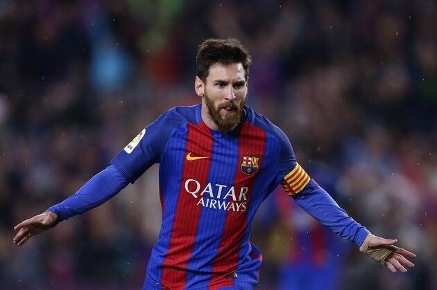 FC Barcelona's Lionel Messi celebrates after scoring during the Spanish La Liga soccer match between FC Barcelona and Real Sociedad at the Camp Nou stadium in Barcelona, Spain, Saturday, April 15, 2017. (AP Photo/Manu Fernandez)