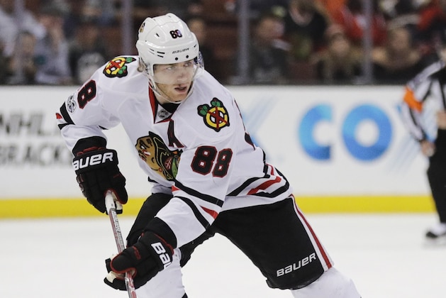 FILE - In this April 6, 2017, file photo, Chicago Blackhawks' Patrick Kane moves the puck during the first period of an NHL hockey game against the Anaheim Ducks, in Anaheim, Calif. The Nashville Predators take on the Blackhawks in the first round of the playoffs, beginning with Game 1 on Thursday, April 13, in Chicago. (AP Photo/Jae C. Hong, File)
