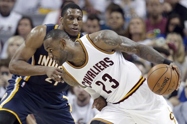 Cleveland Cavaliers' LeBron James (23) drives past Indiana Pacers' Thaddeus Young (21) in the second half in Game 1 of a first-round NBA basketball playoff series, Saturday, April 15, 2017, in Cleveland. The Cavaliers won 109-108. (AP Photo/Tony Dejak)