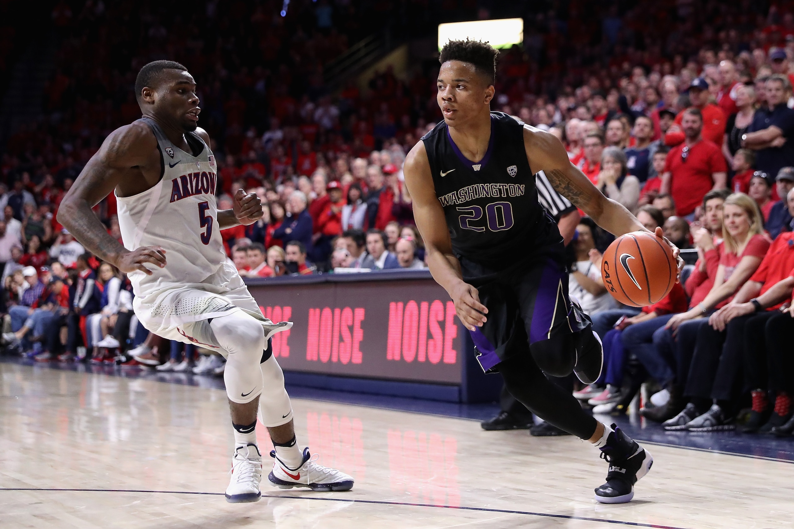 TUCSON, AZ - JANUARY 29:  Markelle Fultz #20 of the Washington Huskies handles the ball against Kadeem Allen #5 of the Arizona Wildcats during the second half of the college basketball game at McKale Center on January 29, 2017 in Tucson, Arizona. The Wildcats defeated the Huskies 77-66.  (Photo by Christian Petersen/Getty Images)