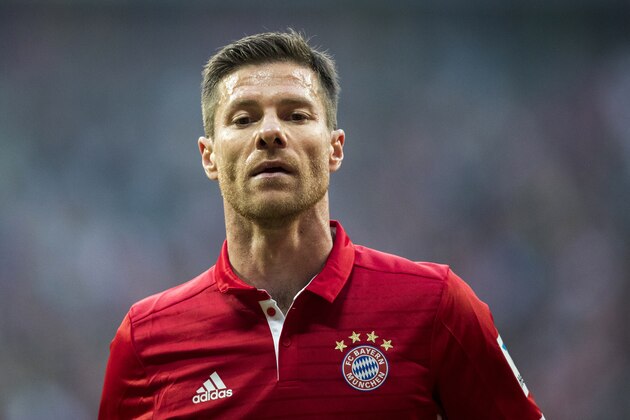 MUNICH, GERMANY - APRIL 08:  Xabi Alonso of FC Bayern Muenchen looks on during the Bundesliga match between Bayern Muenchen and Borussia Dortmund at Allianz Arena on April 8, 2017 in Munich, Germany.  (Photo by Boris Streubel/Getty Images)
