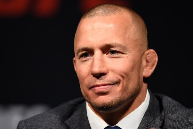 LAS VEGAS, NV - MARCH 03: Georges St-Pierre of Canada interacts with UFC middleweight champion Michael Bisping of England during the UFC press conference at T-Mobile arena on March 3, 2017 in Las Vegas, Nevada. (Photo by Josh Hedges/Zuffa LLC/Zuffa LLC via Getty Images) LAS VEGAS, NV - MARCH 03: Georges St-Pierre of Canada interacts with UFC middleweight champion Michael Bisping of England during the UFC press conference at T-Mobile arena on March 3, 2017 in Las Vegas, Nevada. (Photo by Josh Hedges/Zuffa LLC/Zuffa LLC via Getty Images)